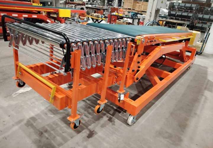 Mobile belt conveyor loading cartons into a 40ft shipping container