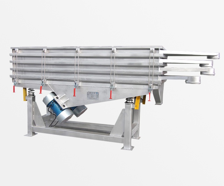 multi deck vibrating screen discharging multiple sized aggregates at quarry site