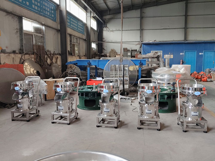 Mobile stainless steel lab and industrial sieve shakers aligned in the manufacturing plant of Dahan Machinery
