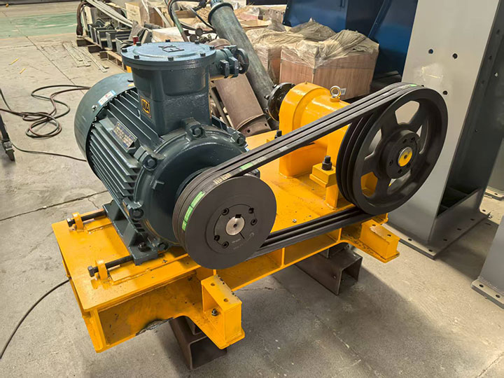 Customized motor, pulley, and belt drive assembly on a steel base fabricated by Dahan Machinery