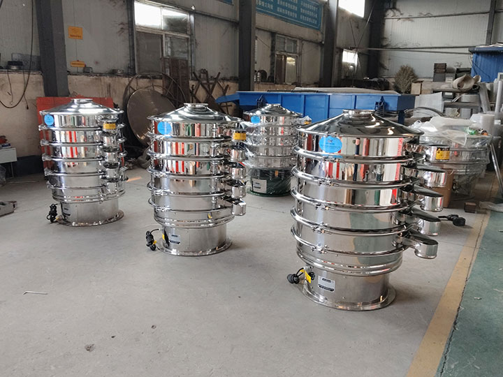 Stainless steel circular vibrating sifters in warehouse inventory ready for shipment.