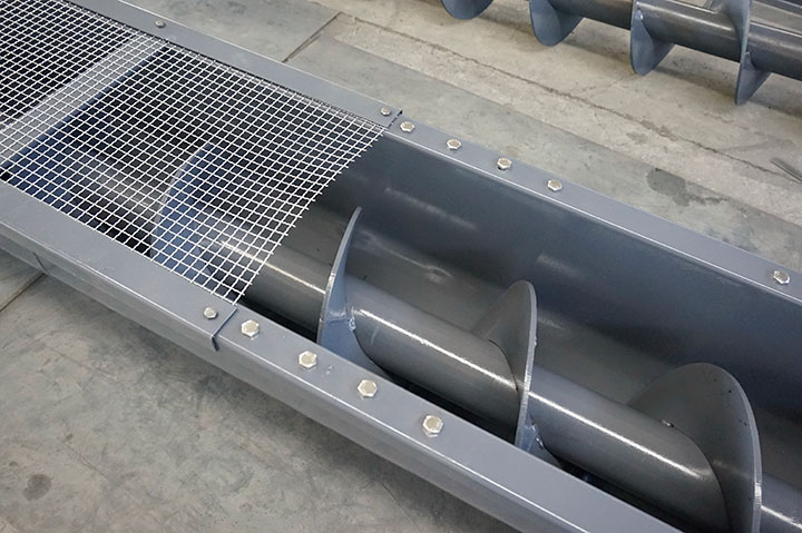 Cutaway view of Dahan industrial screw feeder showing robust auger, thick welded housing