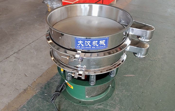 Open-top rotary vibrating sieve showing internal screen mesh for material selection
